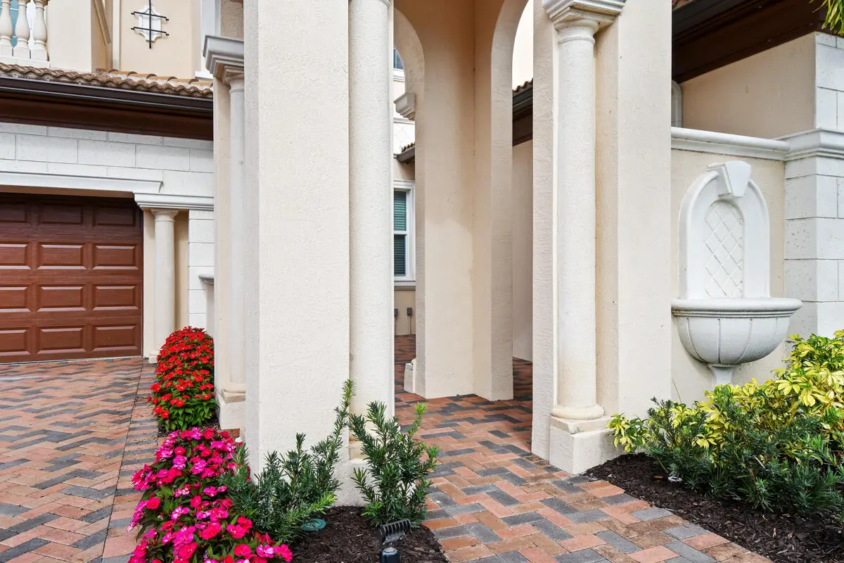 Inviting Courtyard Entry at 159 Tresana Boulevard 113, Jupiter