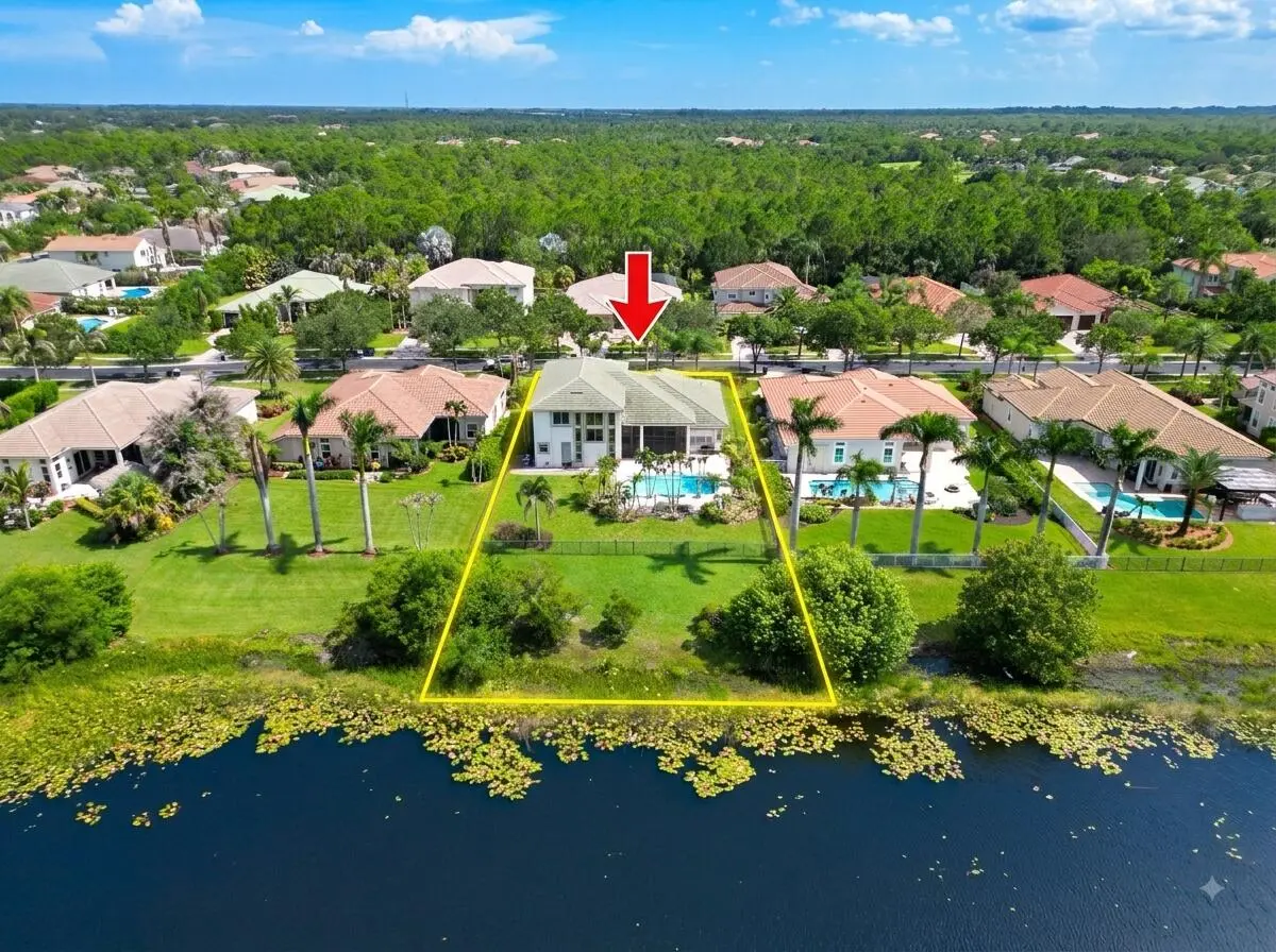 Back of home wiht lake at 2231 SW Manele Place, Palm City