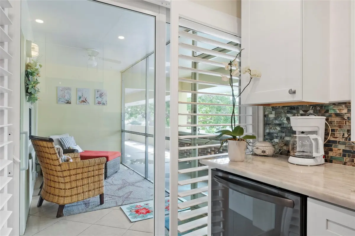 outdoor patio entry off the kitchen at 1340 NE 28TH Avenue 242, Pompano Beach
