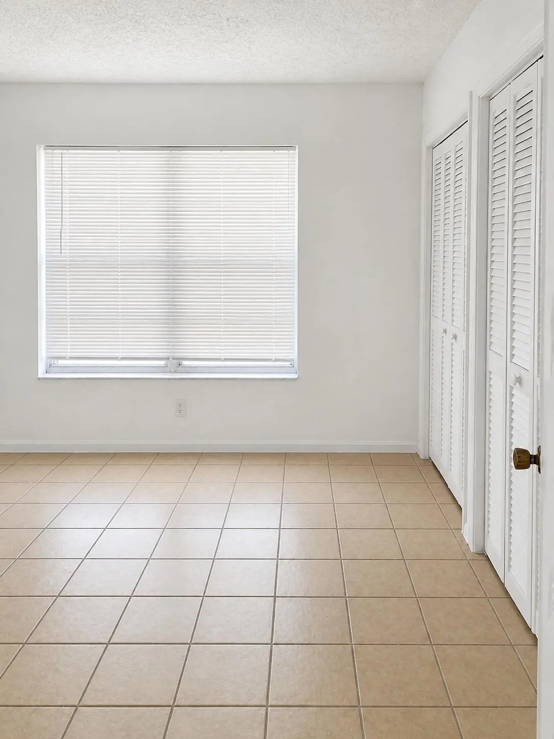 rental-ad-bedroom-closets-window-enhance at 1718 Juno Road 3, North Palm Beach