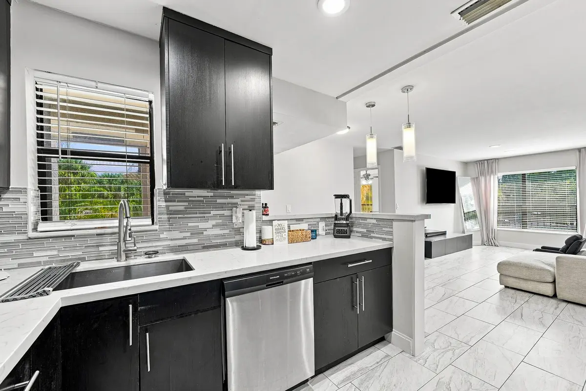 08_dsc06543_with_tv at 2581 Carambola Circle, Coconut Creek