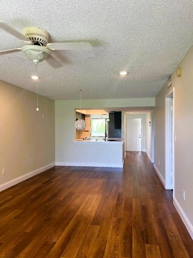 Living Room at 4300 GATOR TRACE Drive H, Fort Pierce