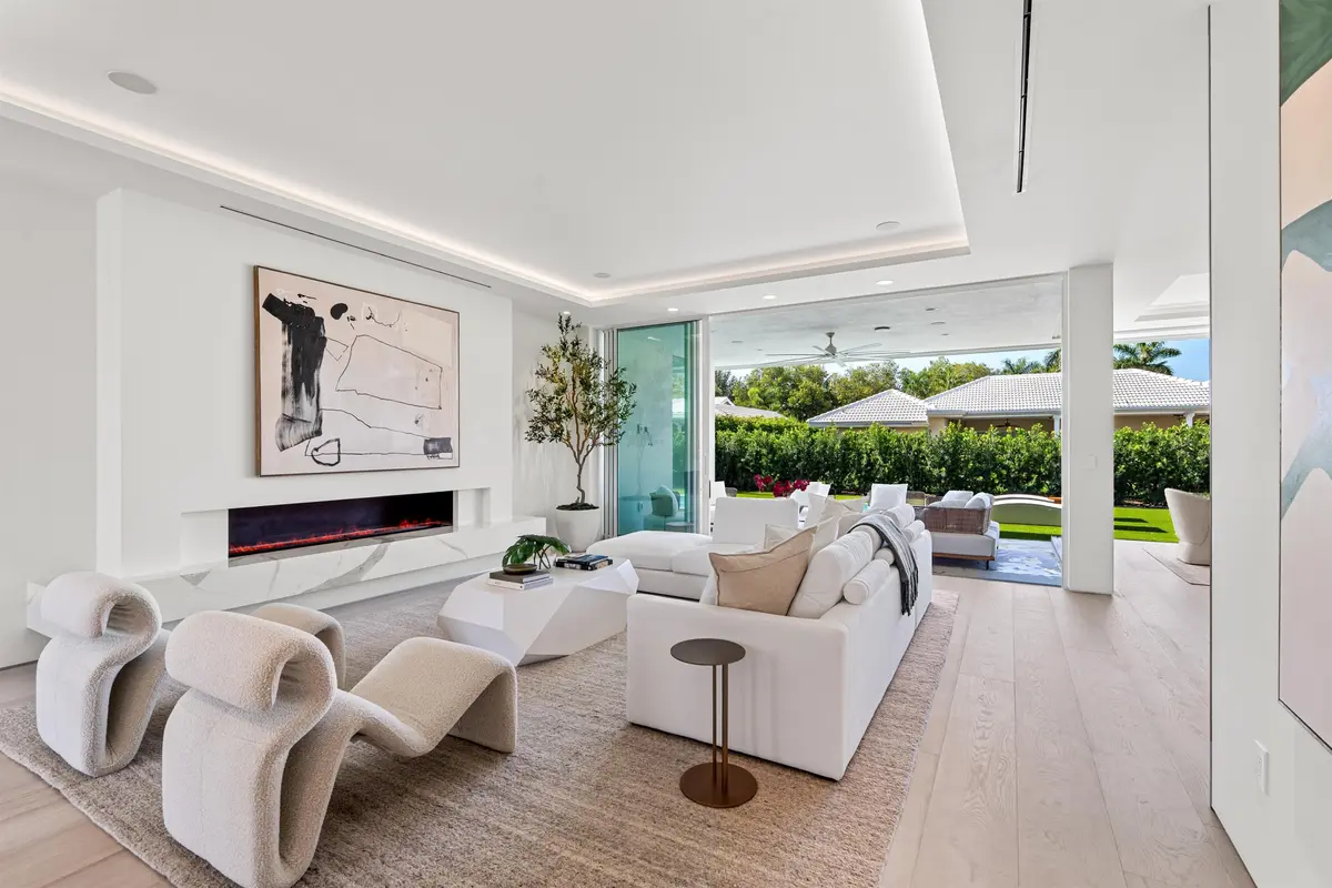 LIVING_ROOM_ANGLE_TO_POOL at 610 JUNEBERRY Court, Boca Raton