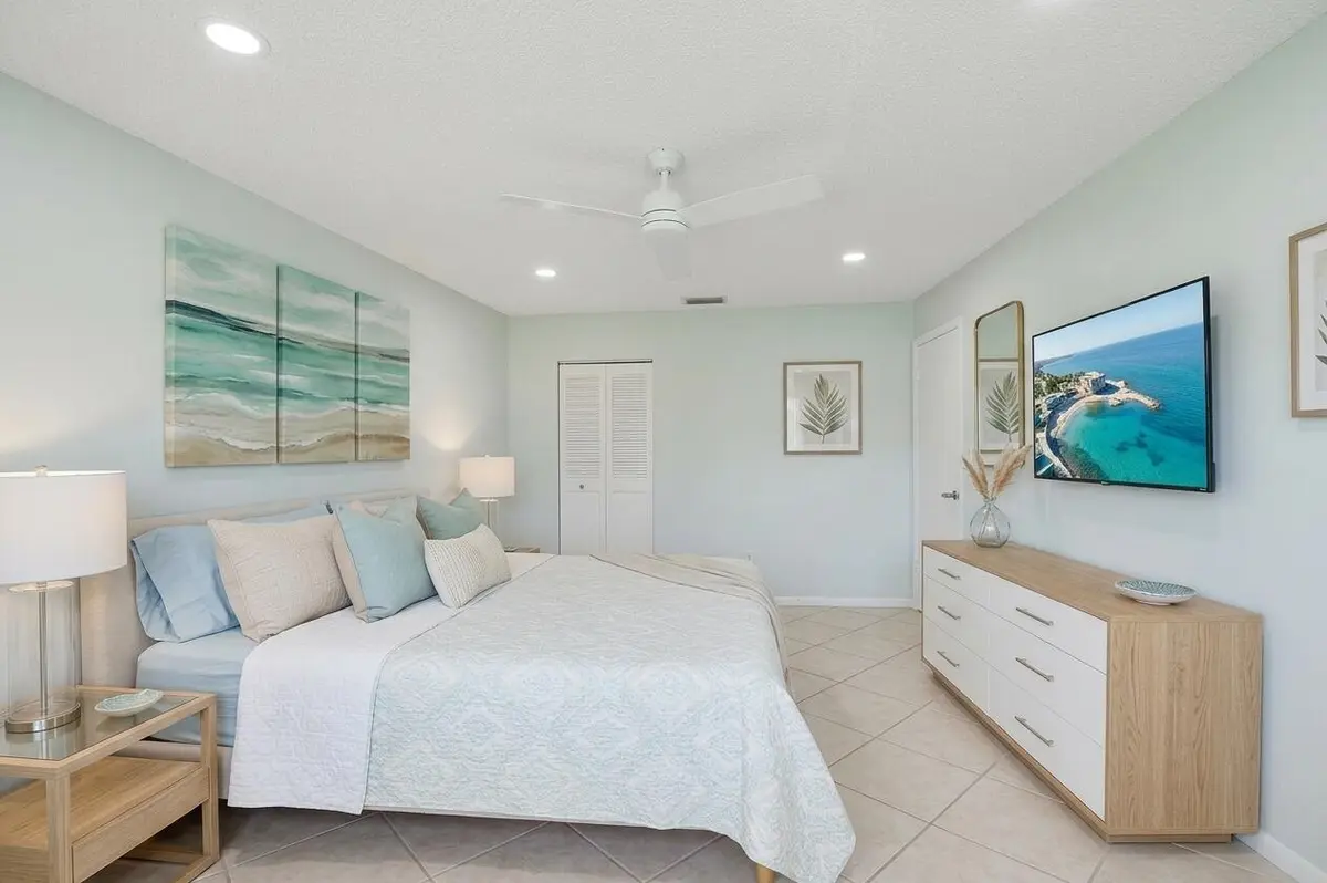 VIRTUAL Primary Bedroom at 7 Southport Lane B, Boynton Beach