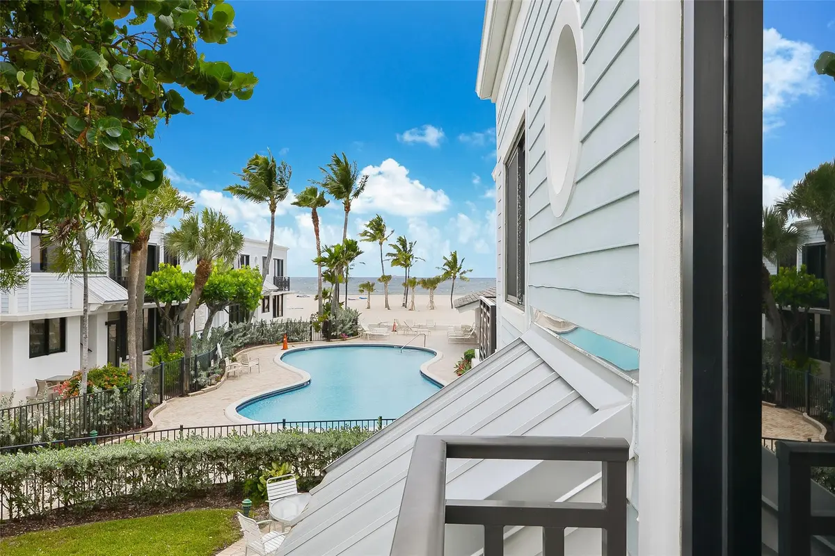 View of pool and ocean from unit balcony at 1630 S OCEAN Lane 235, Fort Lauderdale