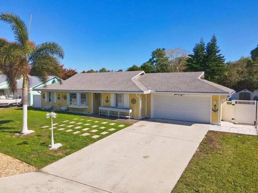 Aerial_Front_Exterior_L.jpeg-FULL.JPEG-S at 888 NE Maranta Terrado, Jensen Beach