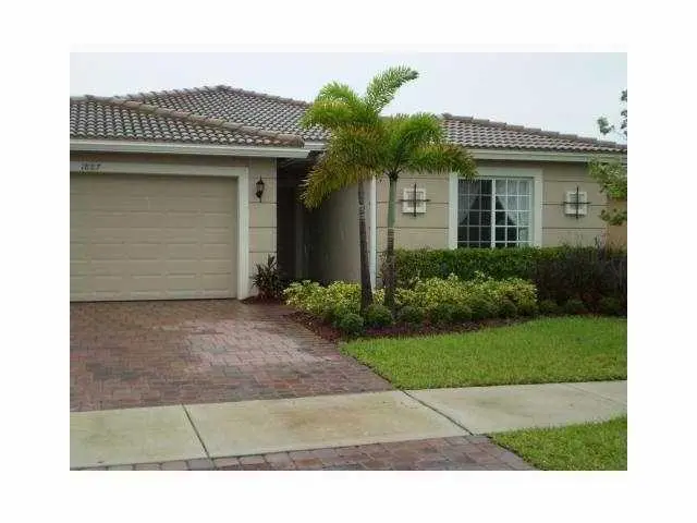 front at 1887 Newport Isles Boulevard, Port St. Lucie