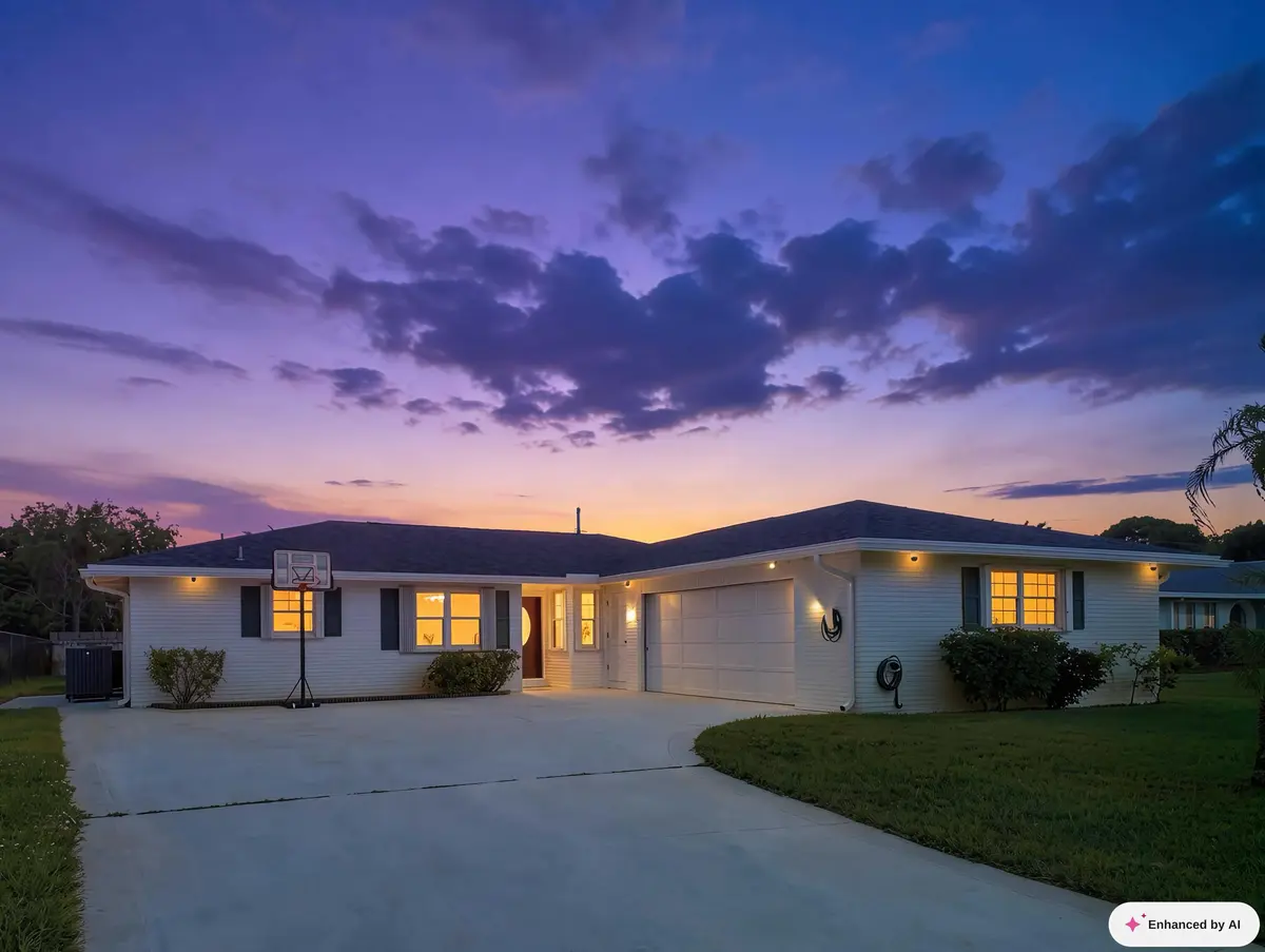 Front Dusk at 441 SW CURRY Street, Port St. Lucie