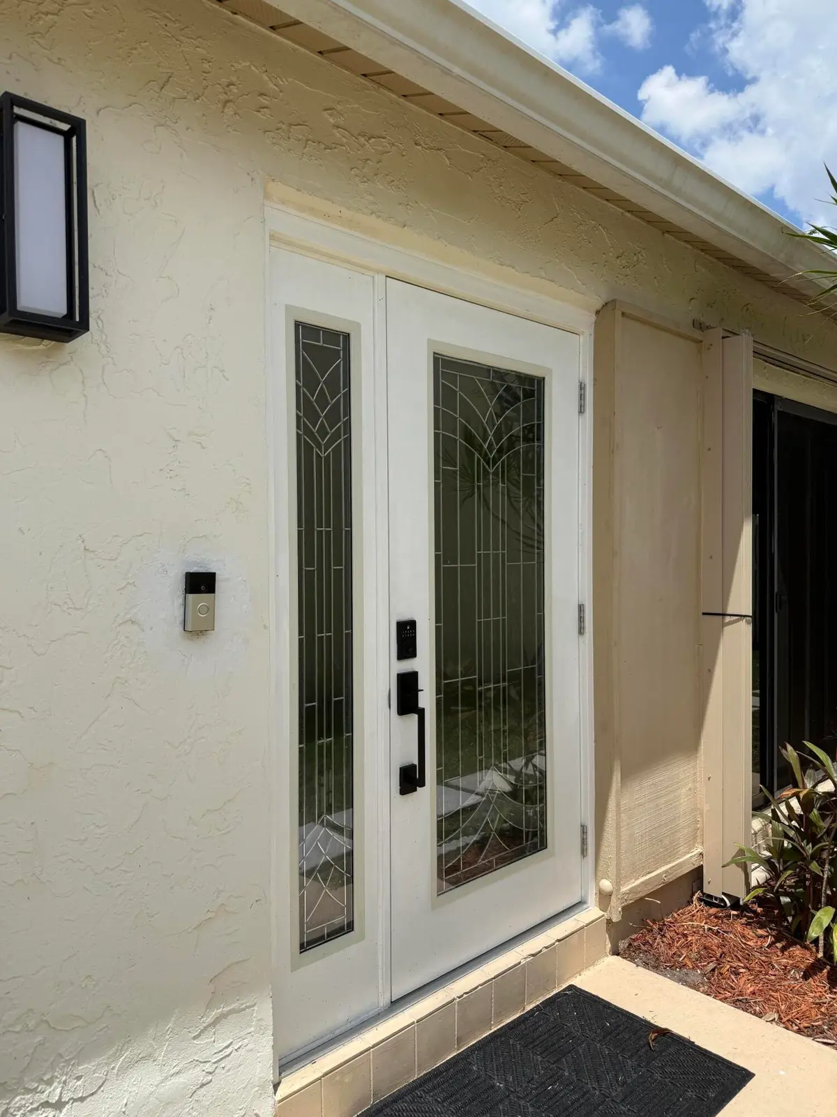 Impact door and sidelight at 5075 Mirror Lakes Boulevard, Boynton Beach