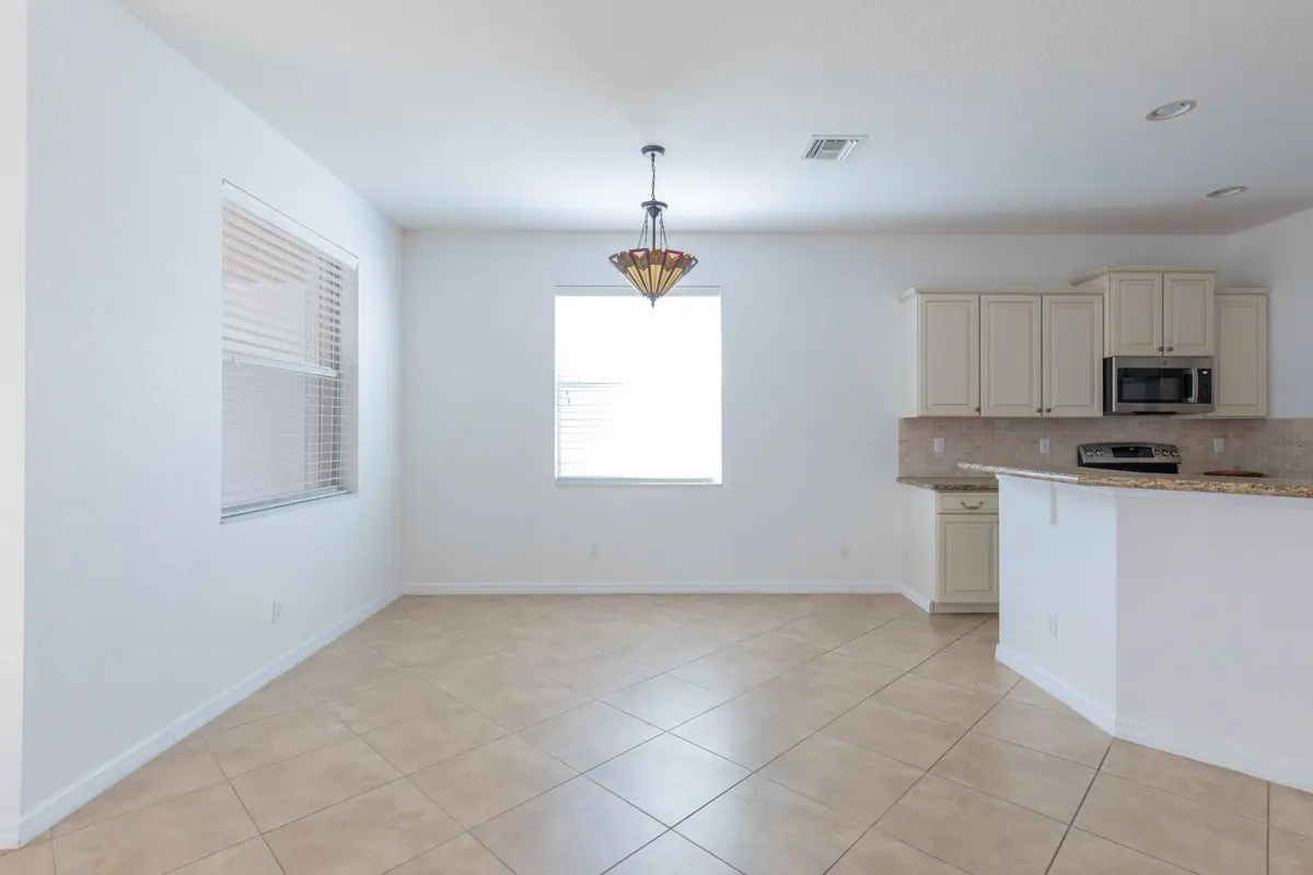 Kitchen Dining Empty at 4376 NW Oakbrook Circle, Jensen Beach