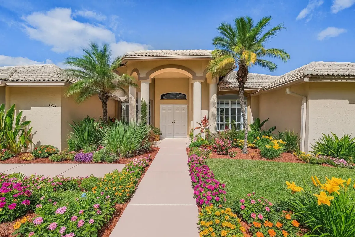 Mediterranean Home with Vibrant Landscap at 8671 155th Place, Palm Beach Gardens