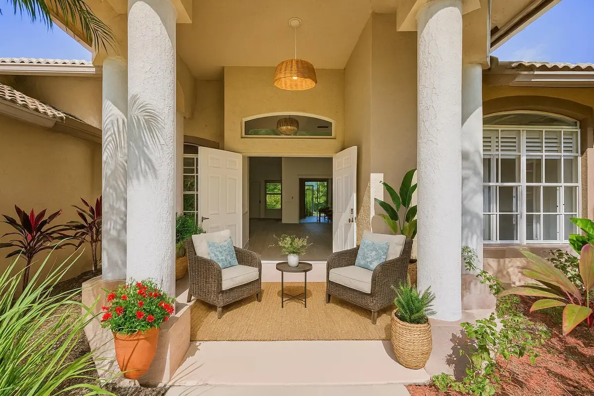 Mediterranean Porch with Open Doors at 8671 155th Place, Palm Beach Gardens