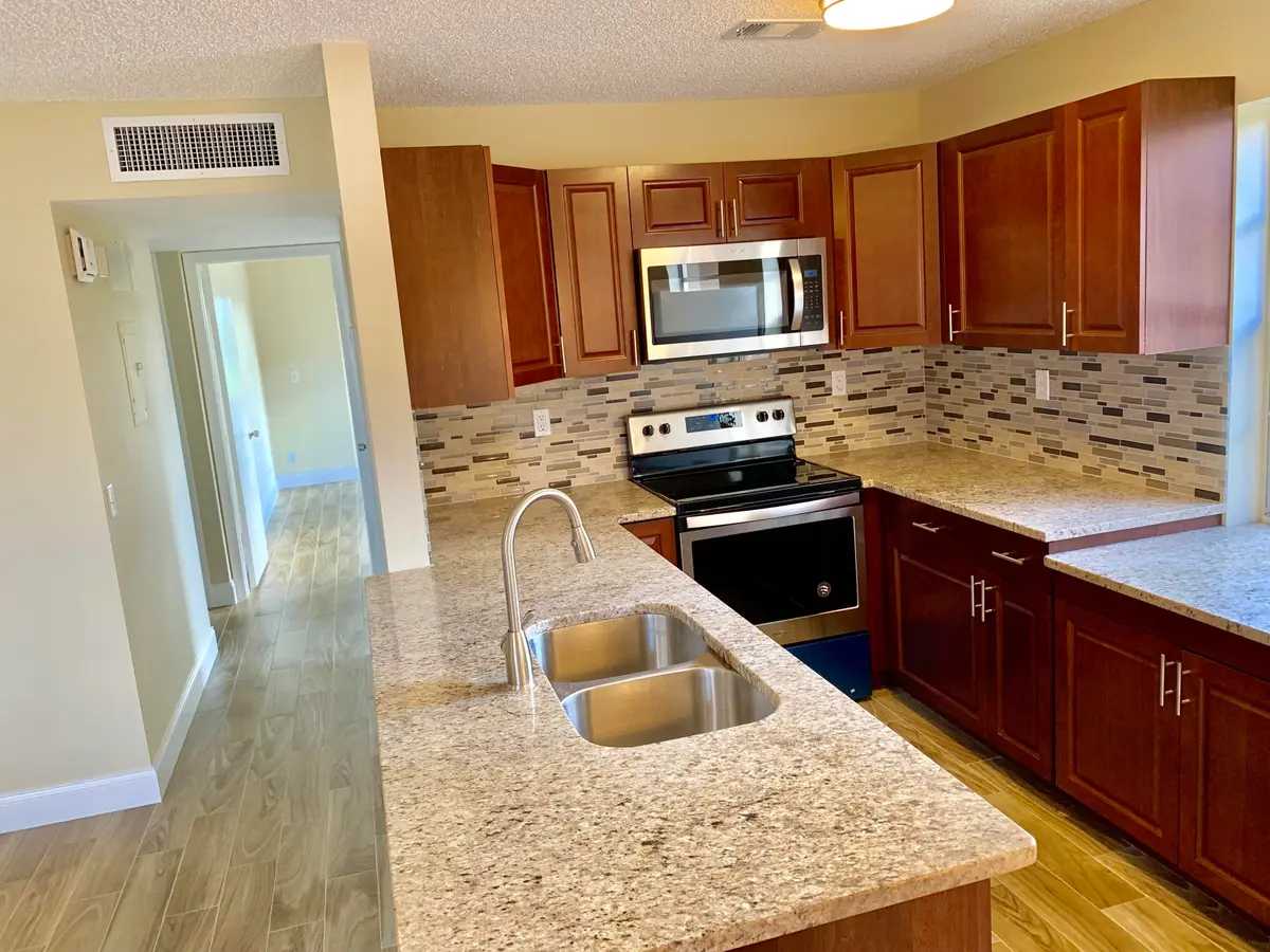 Hall & Open Kitchen at 89 Normandy B, Delray Beach