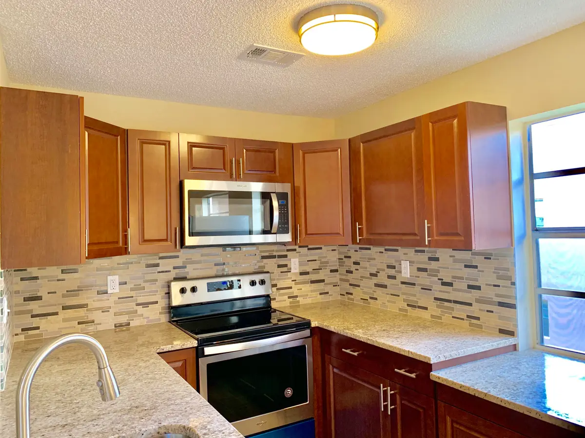 Kitchen - Granite Counters at 89 Normandy B, Delray Beach