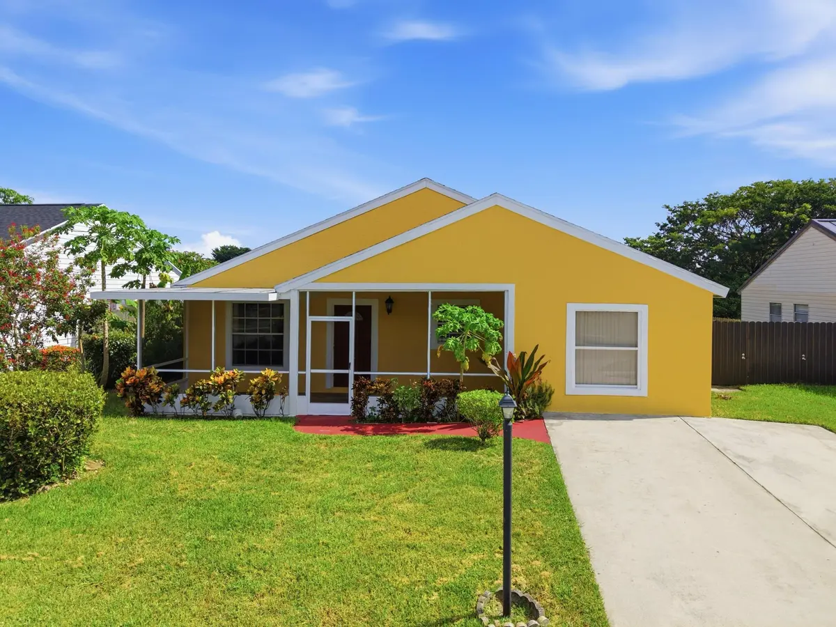 Front 1 at 7702 Blairwood Circle, Greenacres