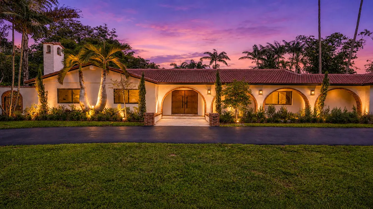 02_twilight_front_brightened_4K (1) at 11851 NW 7TH Street, Plantation
