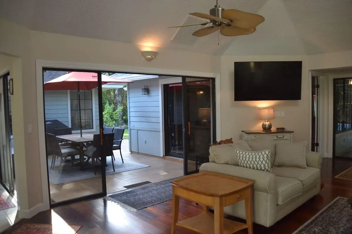 29_Living_Room_to_Atrium at 1251 SW CARL METZ Lane, Palm City