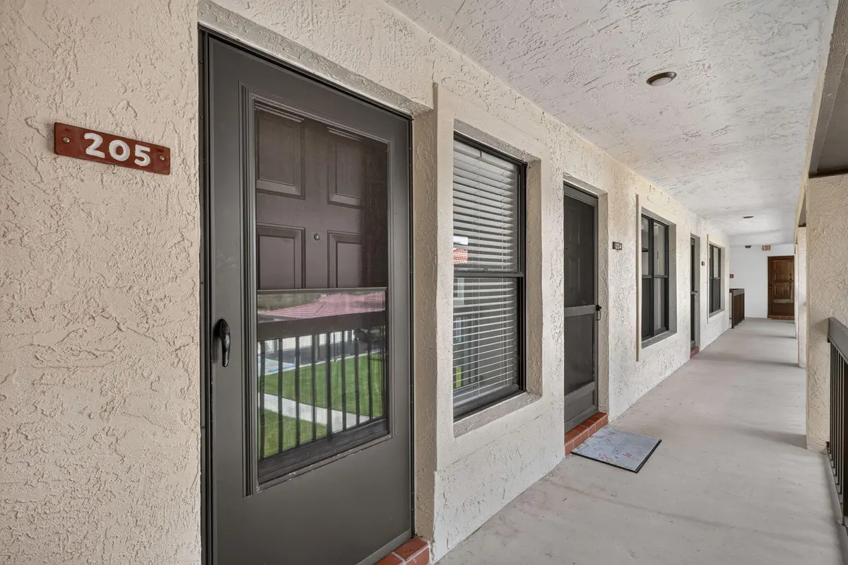 Front Covered Patio Entry at 360 SW SOUTH RIVER Drive 205, Stuart
