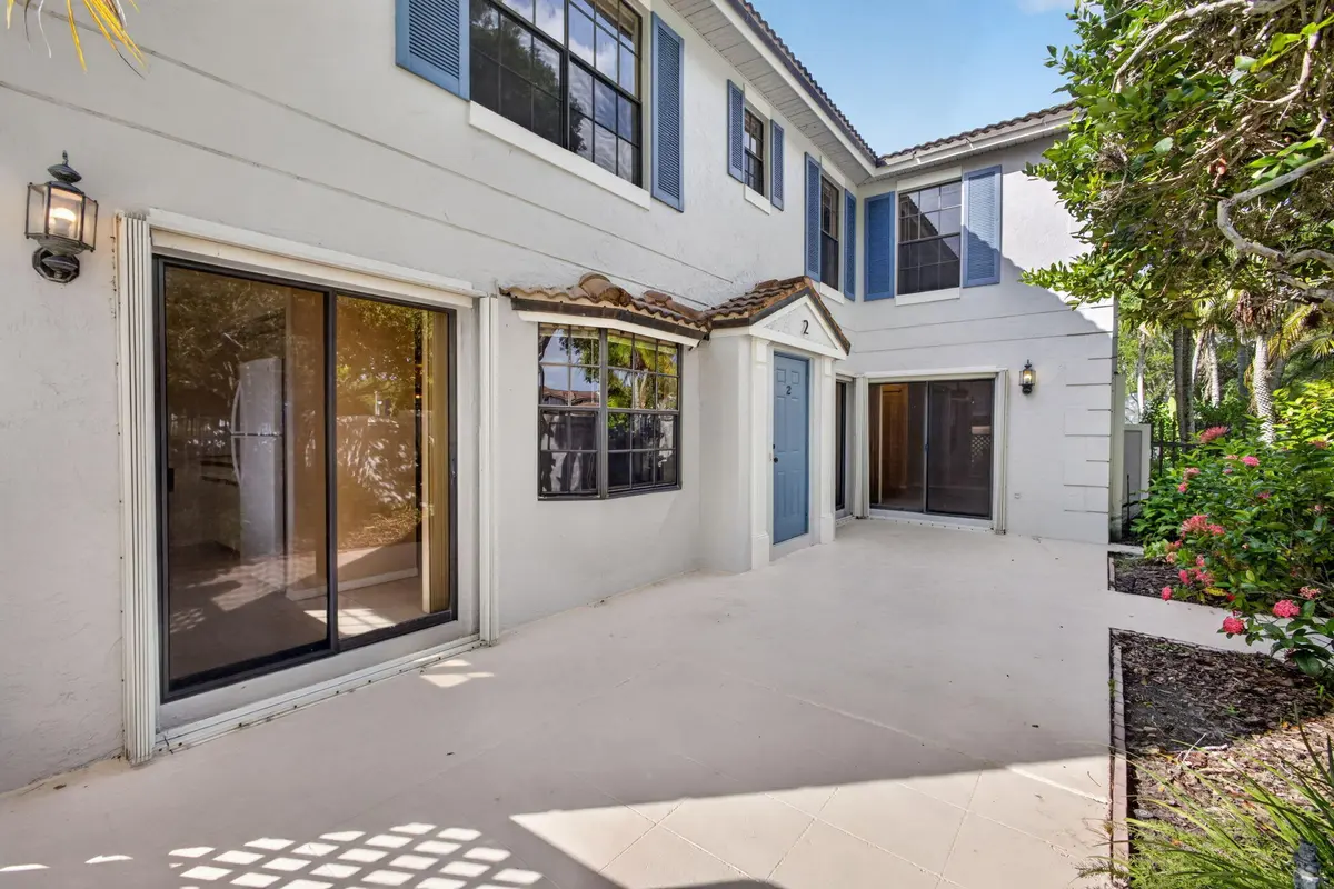 Patio shaded in afternoons/evenings! at 350 Prestwick Circle 2, Palm Beach Gardens