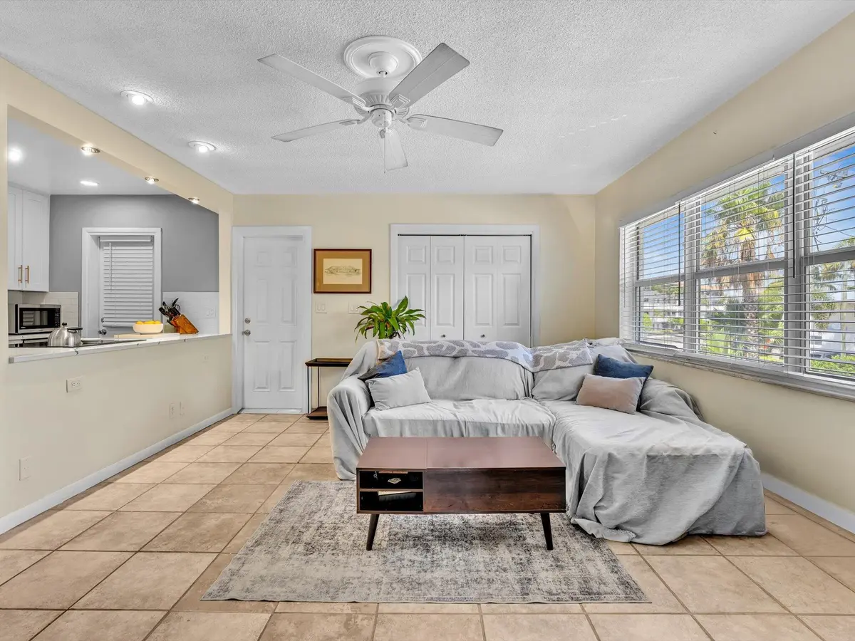 Living Room open to Kitchen at 90 NE 19th Avenue 10, Deerfield Beach