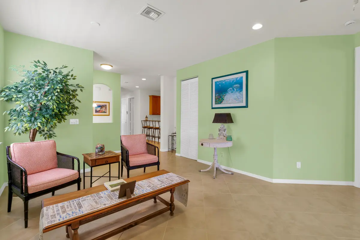 Living Area towards Kitchen at 6380 OXFORD Circle 104D, Vero Beach