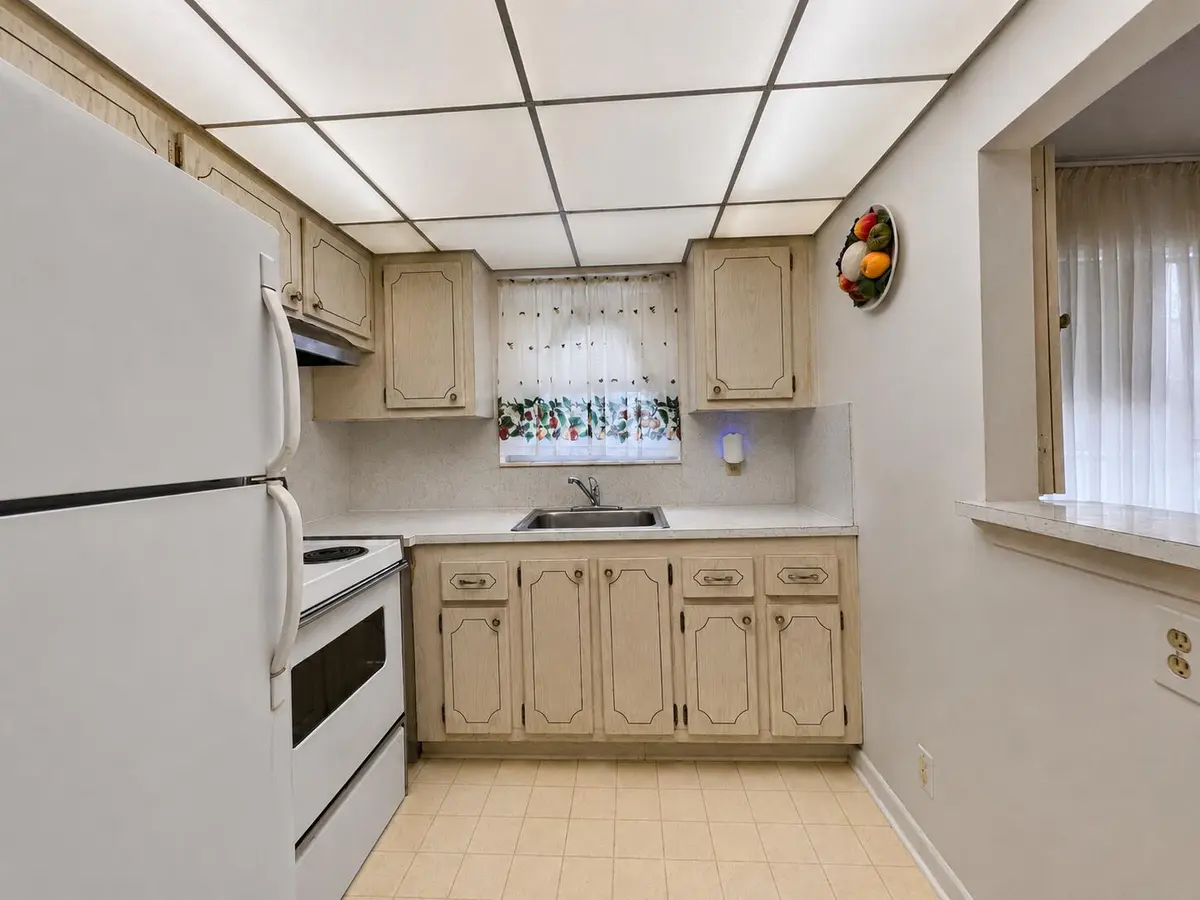 Kitchen - Corner Unit at 229 Dorchester J, West Palm Beach