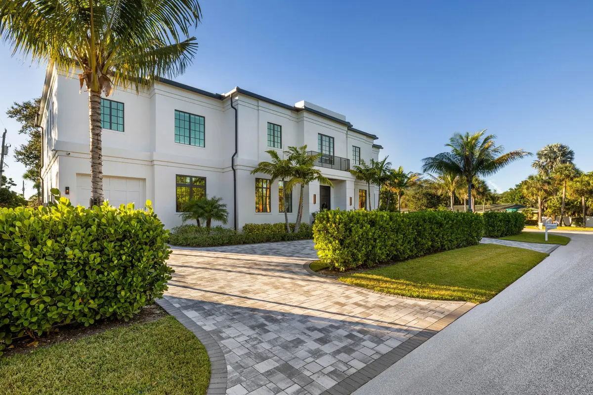 Front Exterior at 12385 COCONUT ROW Road, Palm Beach Gardens