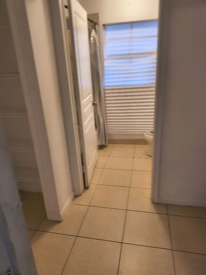 638 PEPPERGRASS RUN HALLWAY AND 2ND BATH at 638 PEPPERGRASS Run, Royal Palm Beach