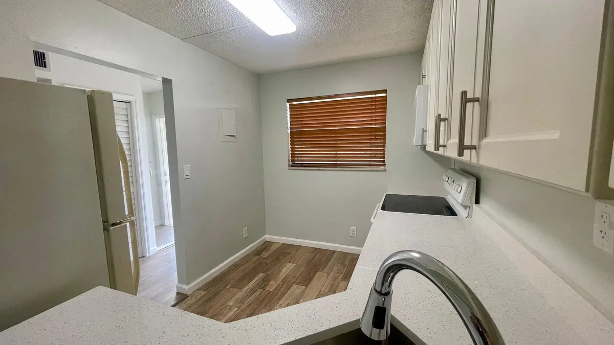 1801- Kitchen view from living room at 1801 NW 75TH Avenue 211, Plantation