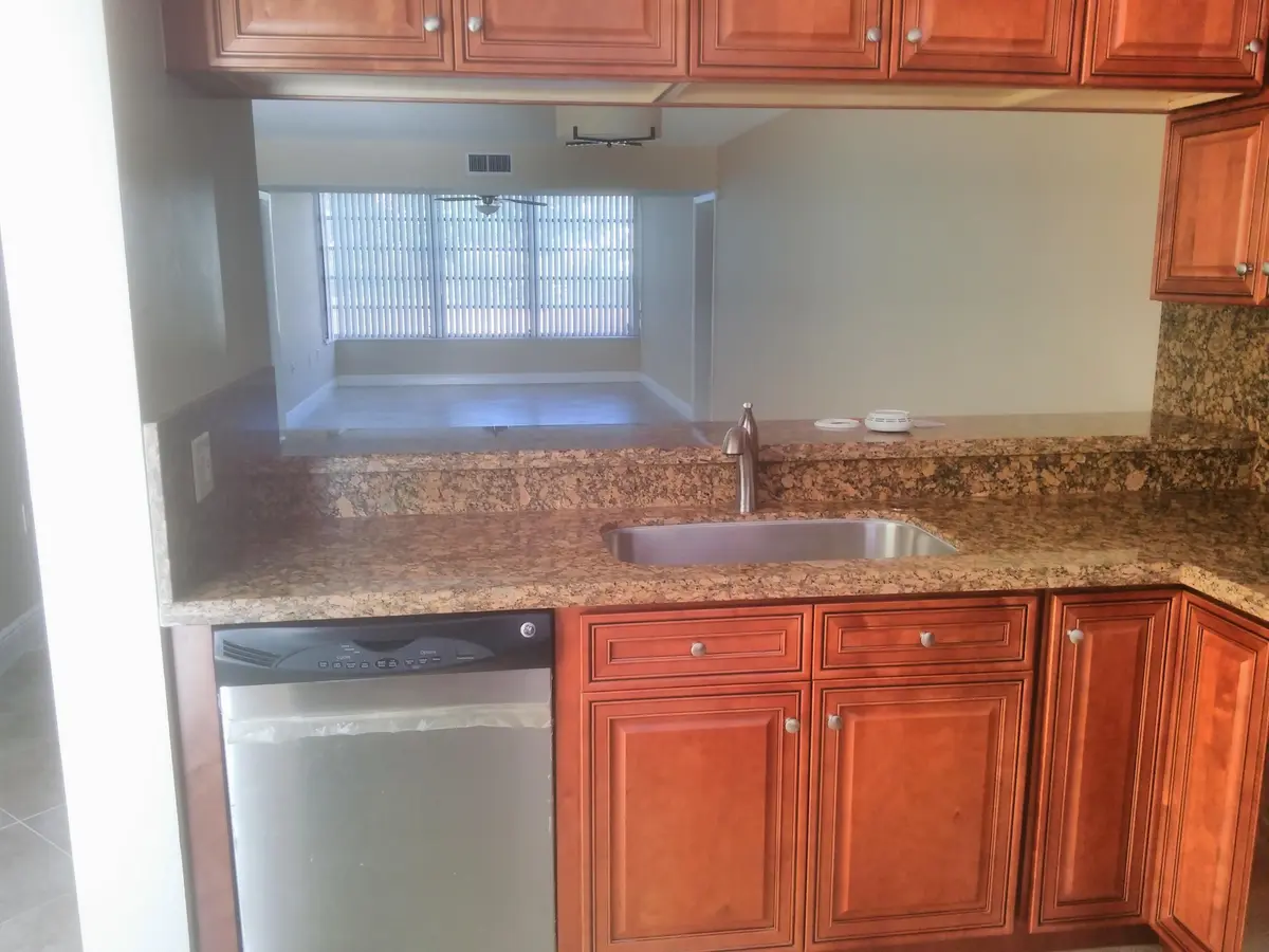 Pass-thru to Dining Room at 3710 Whitehall Drive 103, West Palm Beach