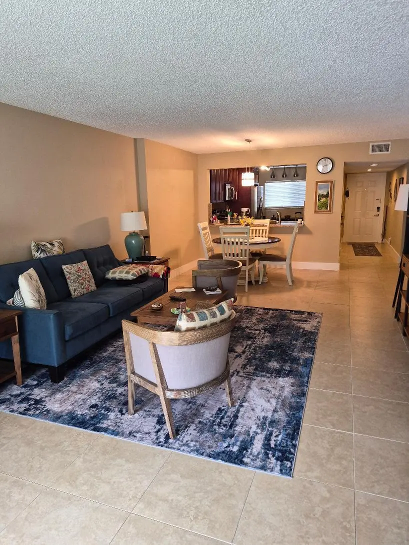 Livig room dining room at 5574 Witney Drive 206, Delray Beach