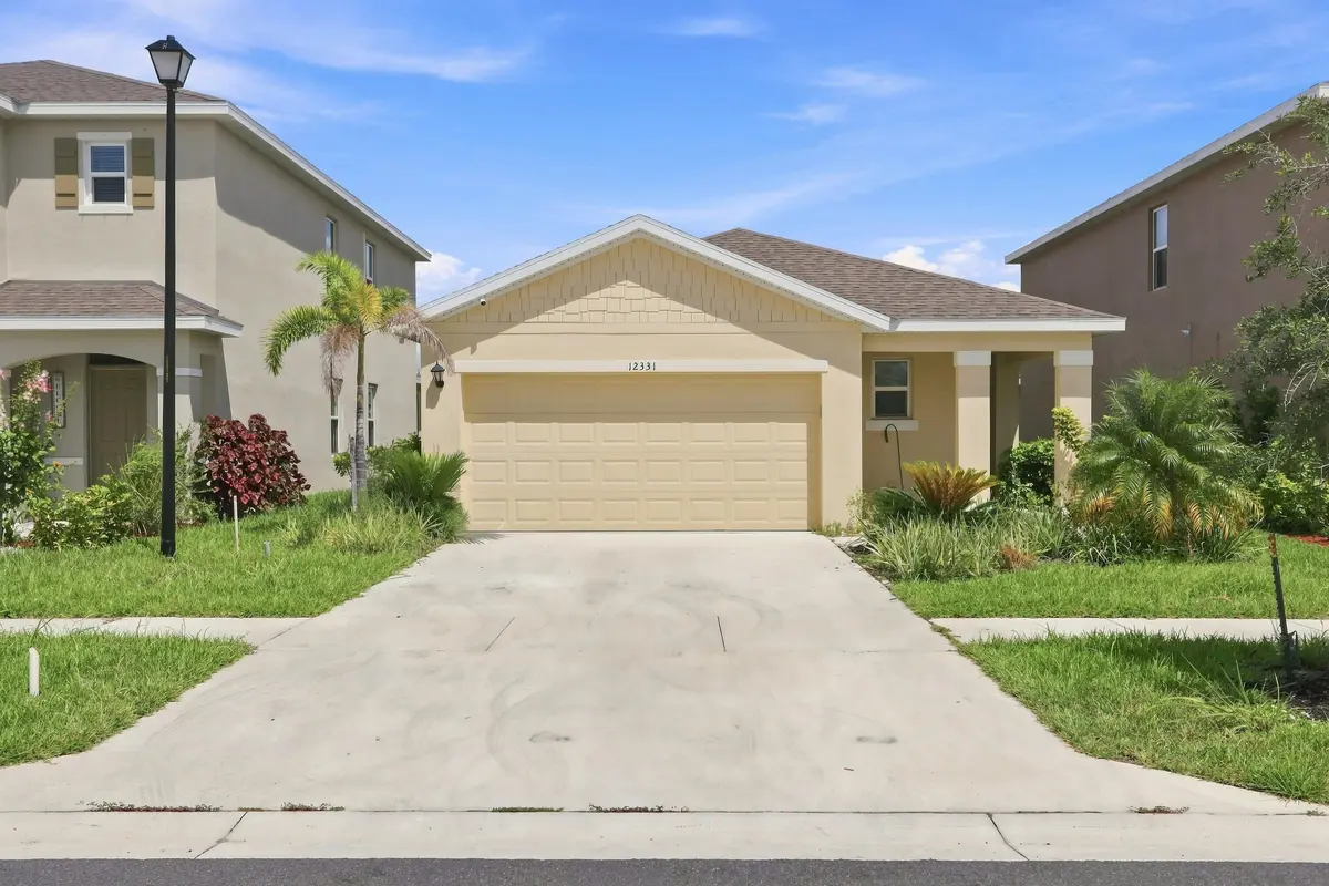 2_2. front elevation at 12331 Rimini Way, Port St. Lucie