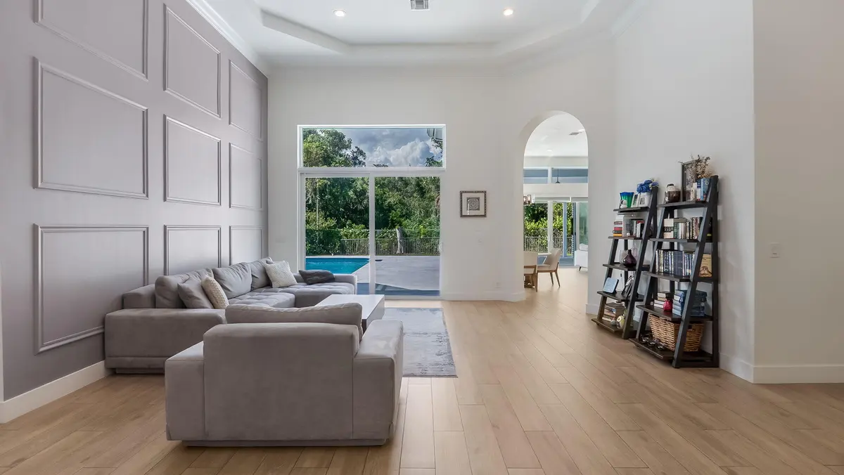 Spacious living room with pool view at 7083 NW 71ST Manor, Parkland