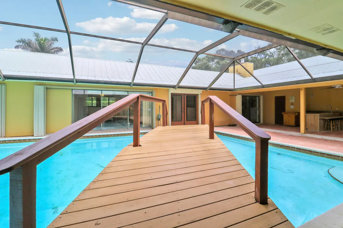 Courtyard Pool Home at 3459 SW WOODCREEK Trail, Palm City