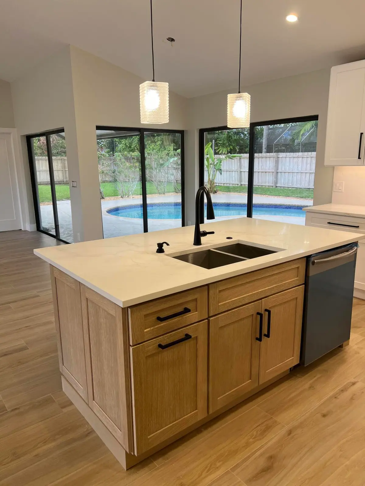 Pool View from kitchen at 199 SW 15th Court, Boca Raton