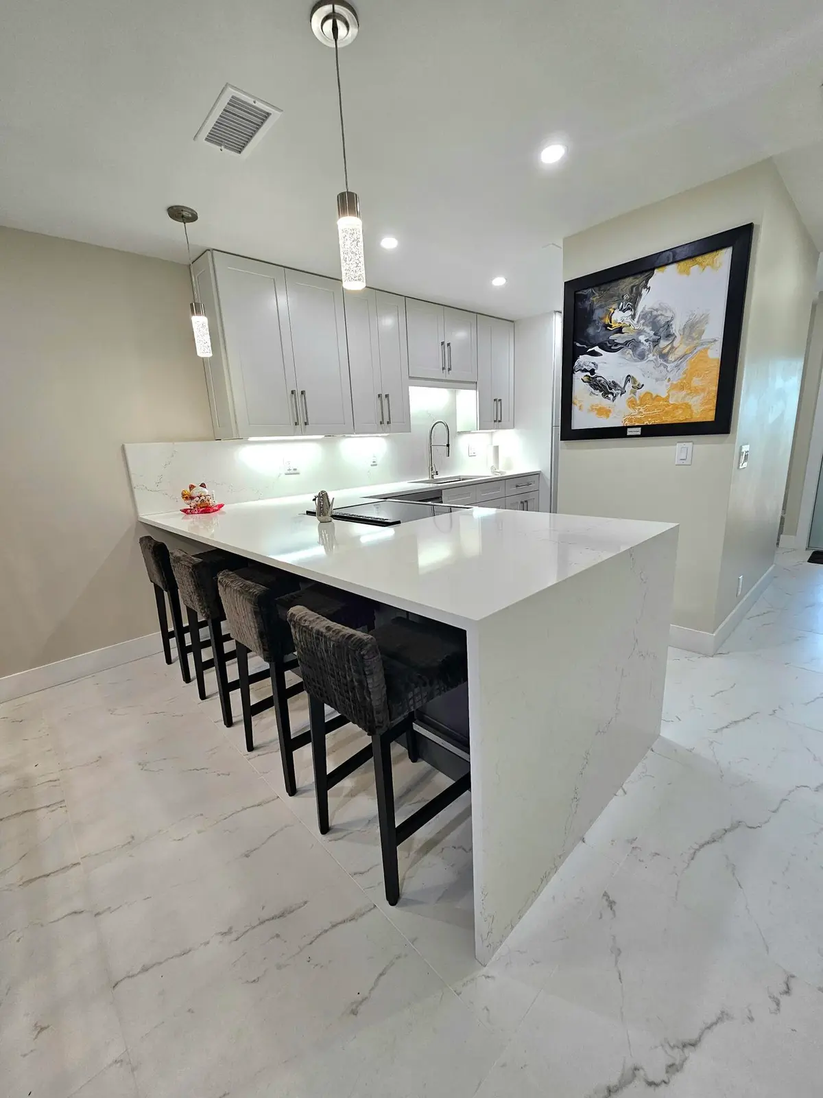 Oversized Quartz Penisula with Waterfall at 1631 NW 18th Avenue 201, Delray Beach