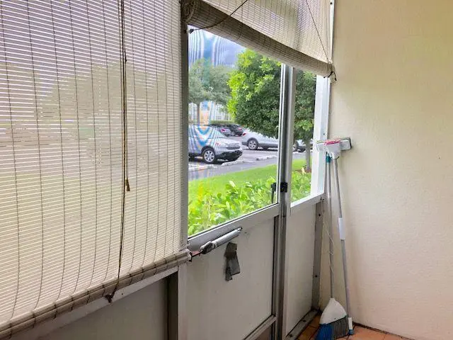 Screened Patio with Door at 302 Mansfield H, Boca Raton
