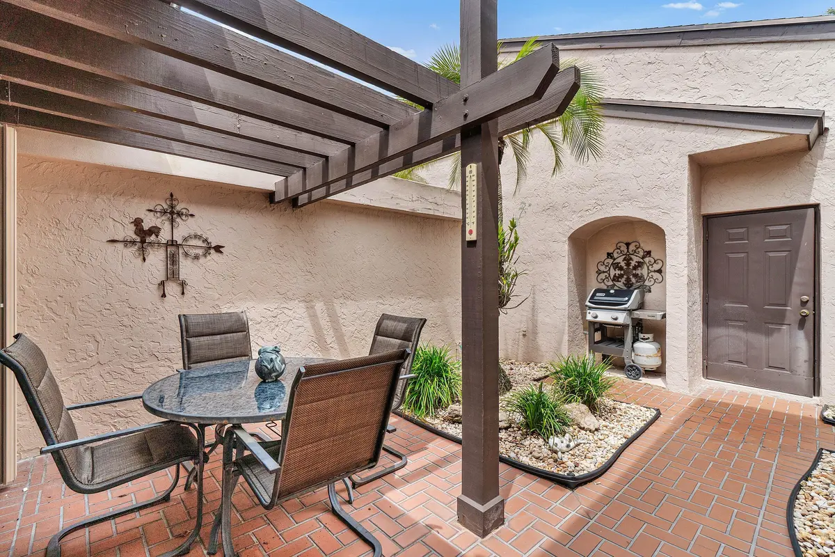 Peaceful Courtyard at 5260 Fairway Woods Drive 3911, Delray Beach
