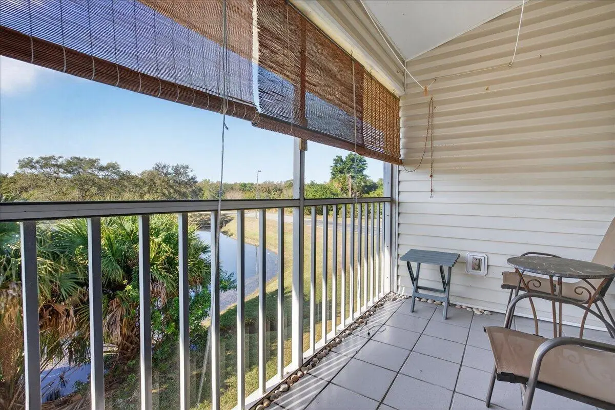 Screened Porch with Lake View at 1810 Waterford Drive 6, Vero Beach