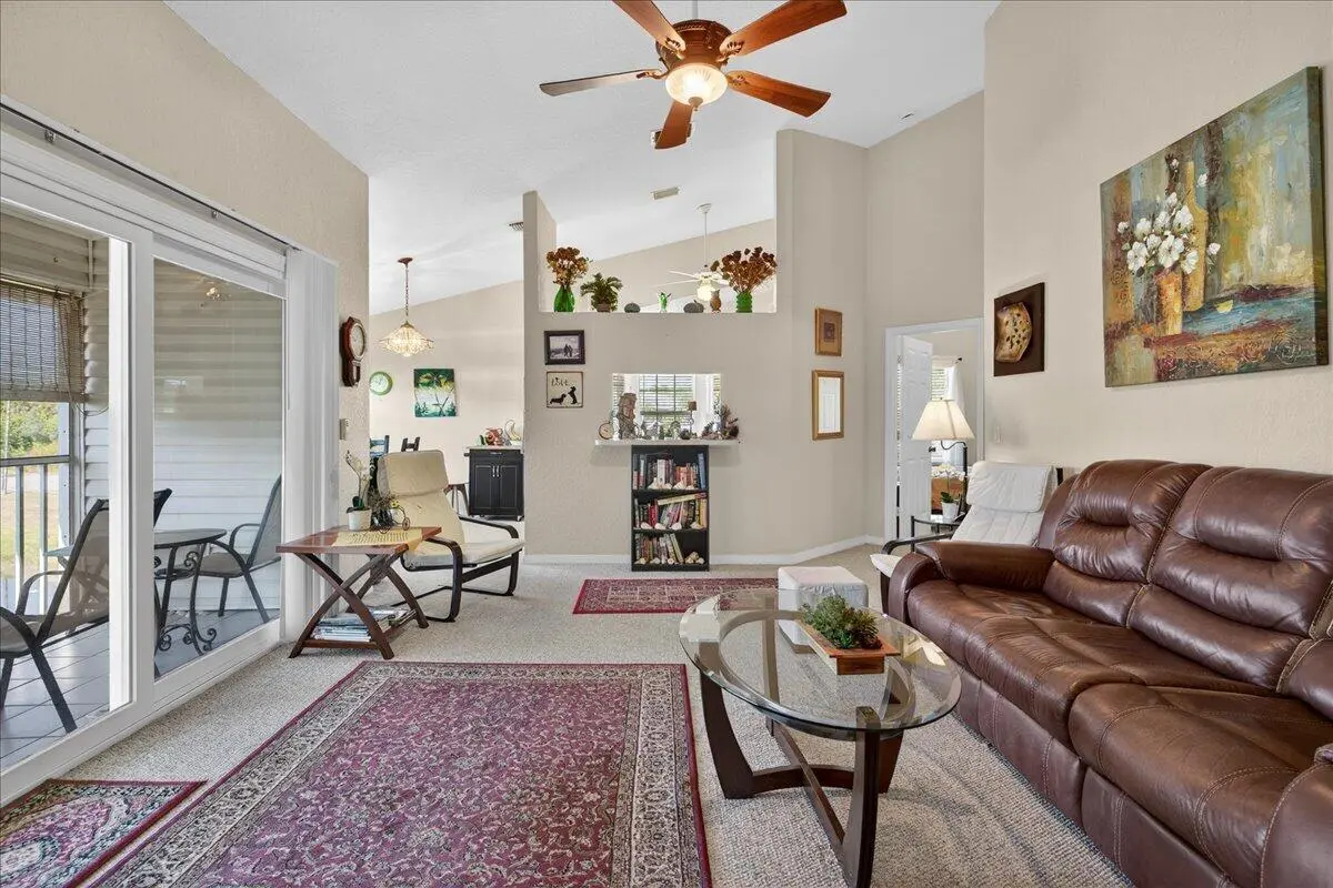 Living Room to Kitchen, Dining Room at 1810 Waterford Drive 6, Vero Beach