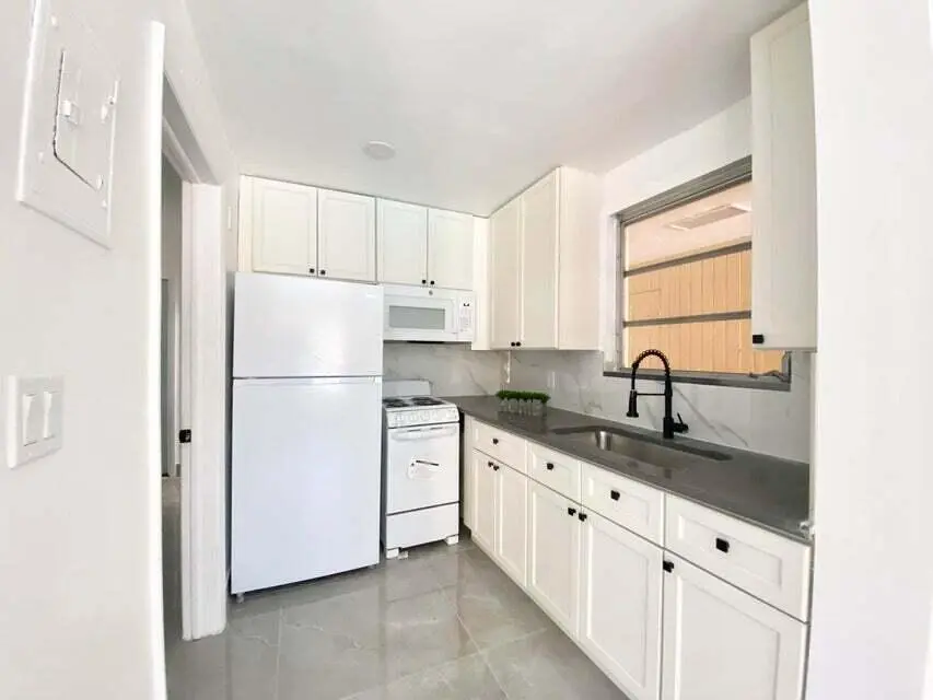 20220824221057991621000000-o at 660 NE 34th Court 3, Oakland Park
