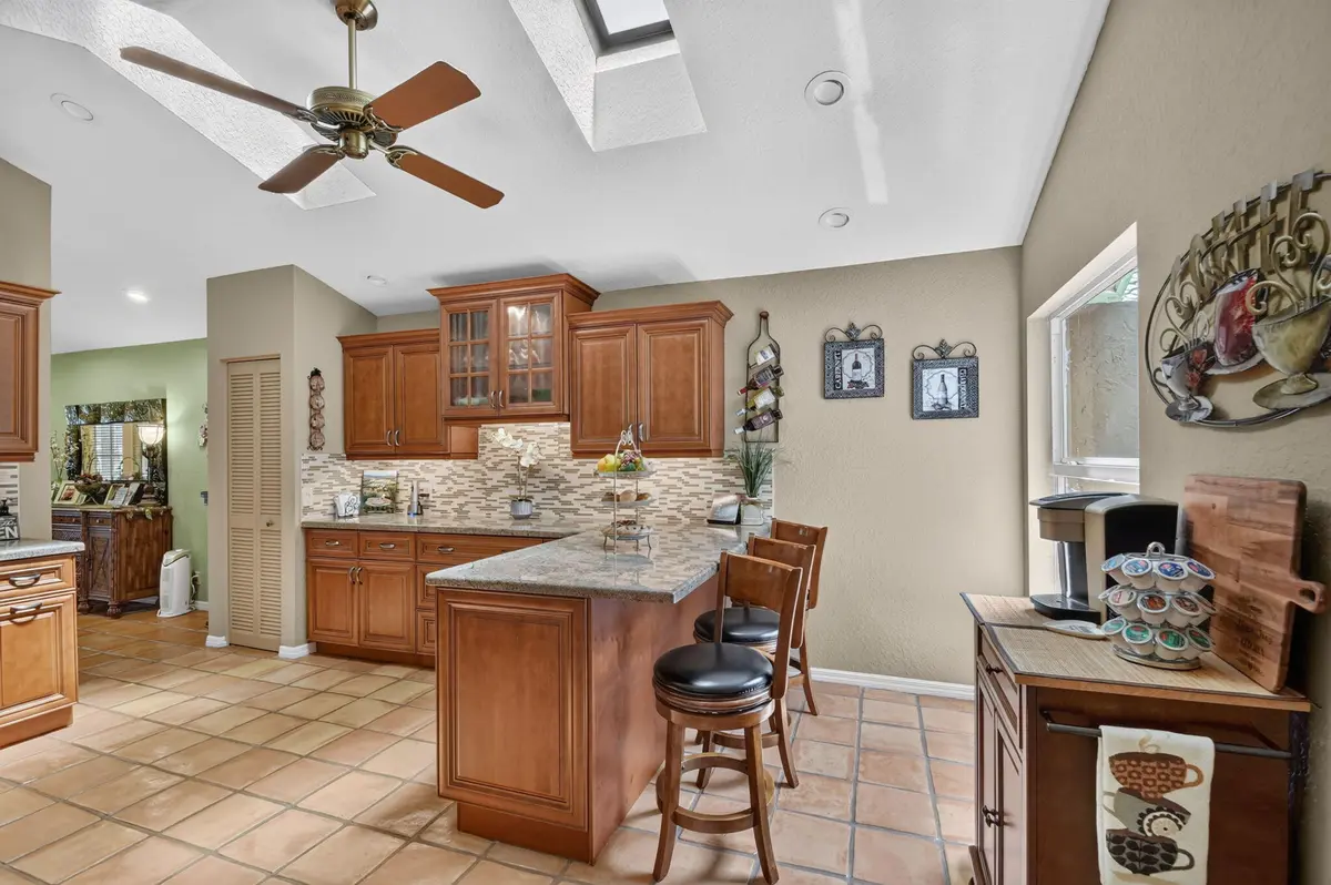 Kitchen breakfast bar at 6097 Bay Isles Drive, Boynton Beach