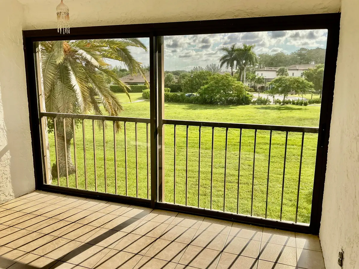 Glass enclosed patio at 9264 Vista Del Lago H, Boca Raton
