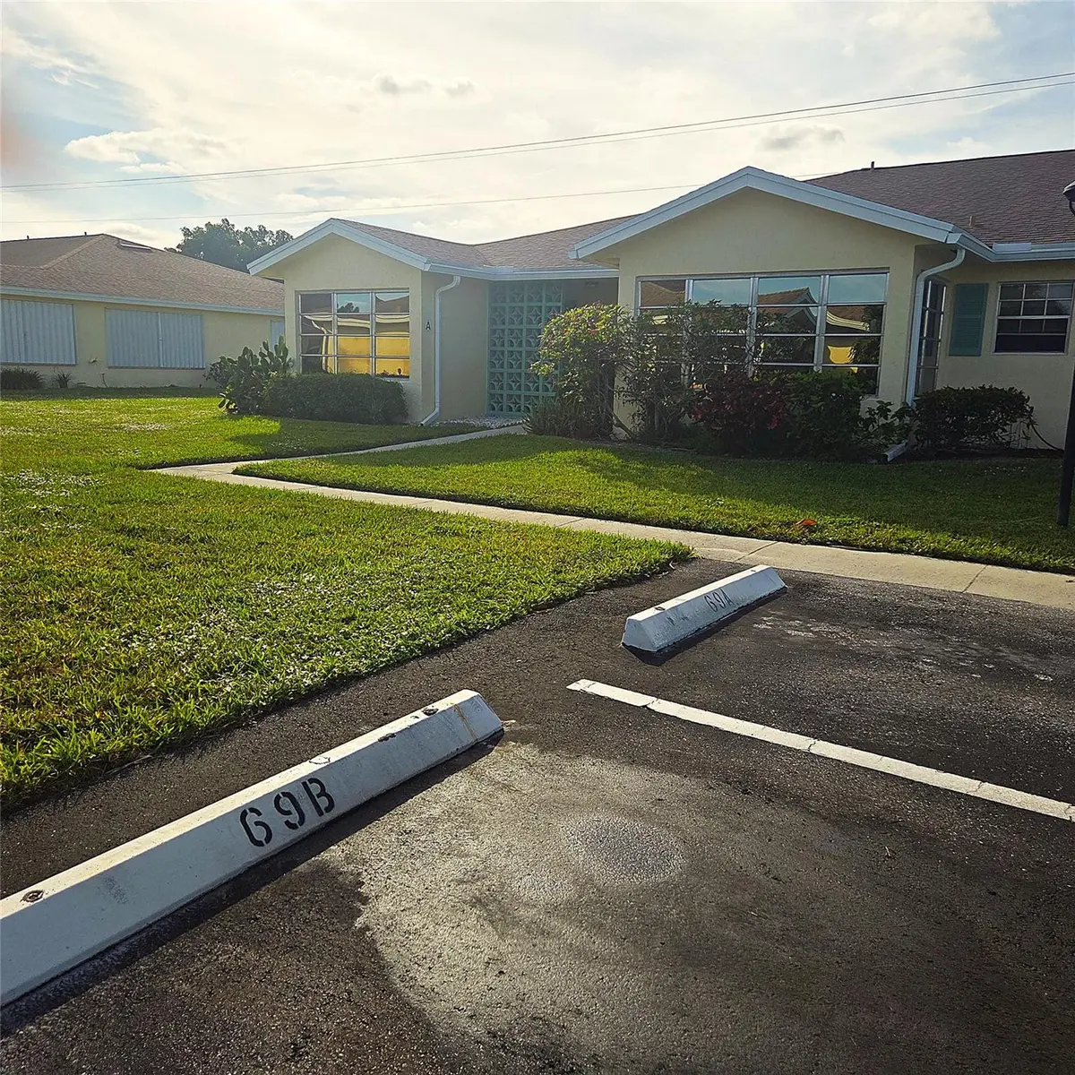 Park right in front of unit at 5385 LAKEFRONT Boulevard A, Delray Beach