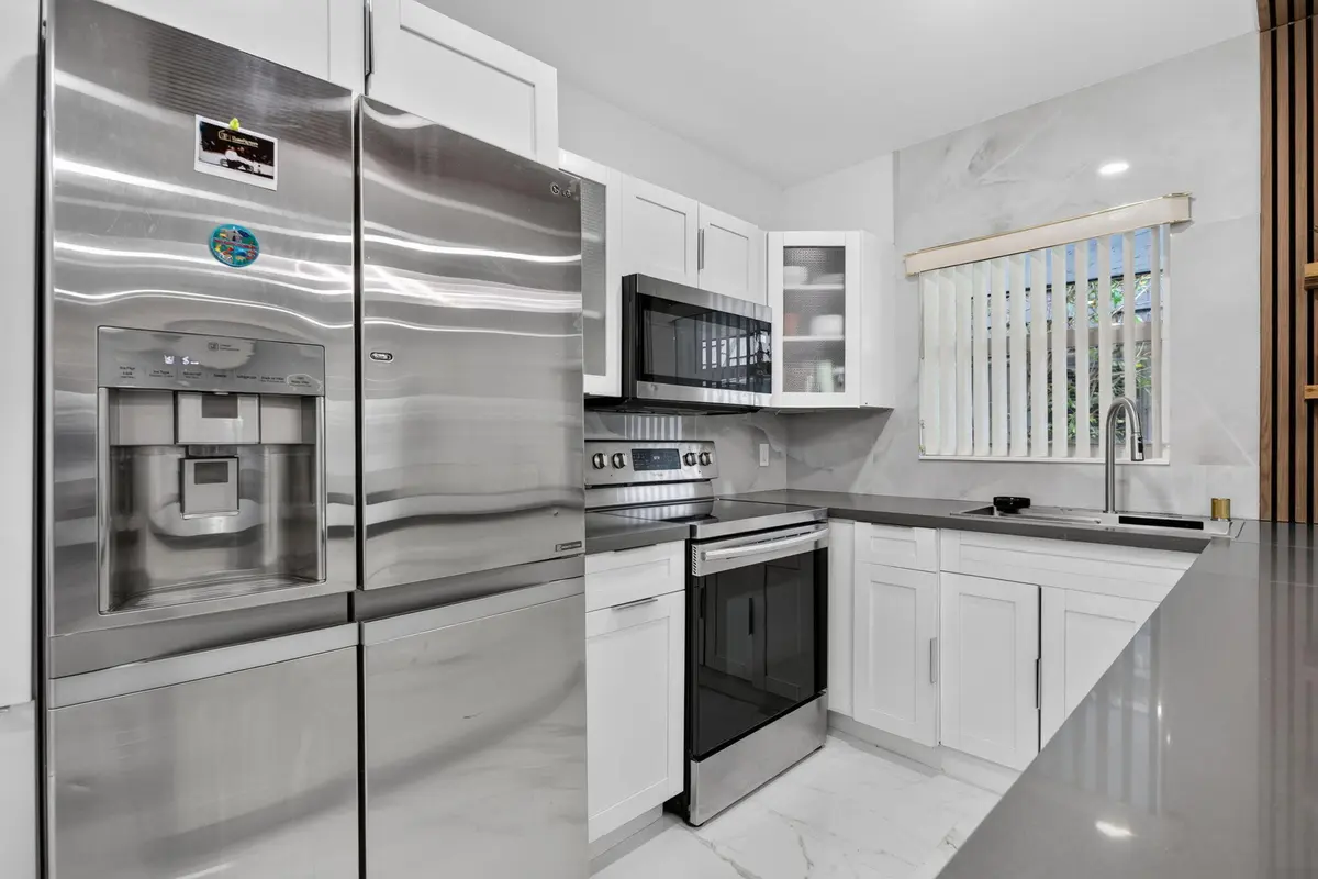 8-web-or-mls-8404 -8004 at 8404 W SAMPLE Road 230, Coral Springs