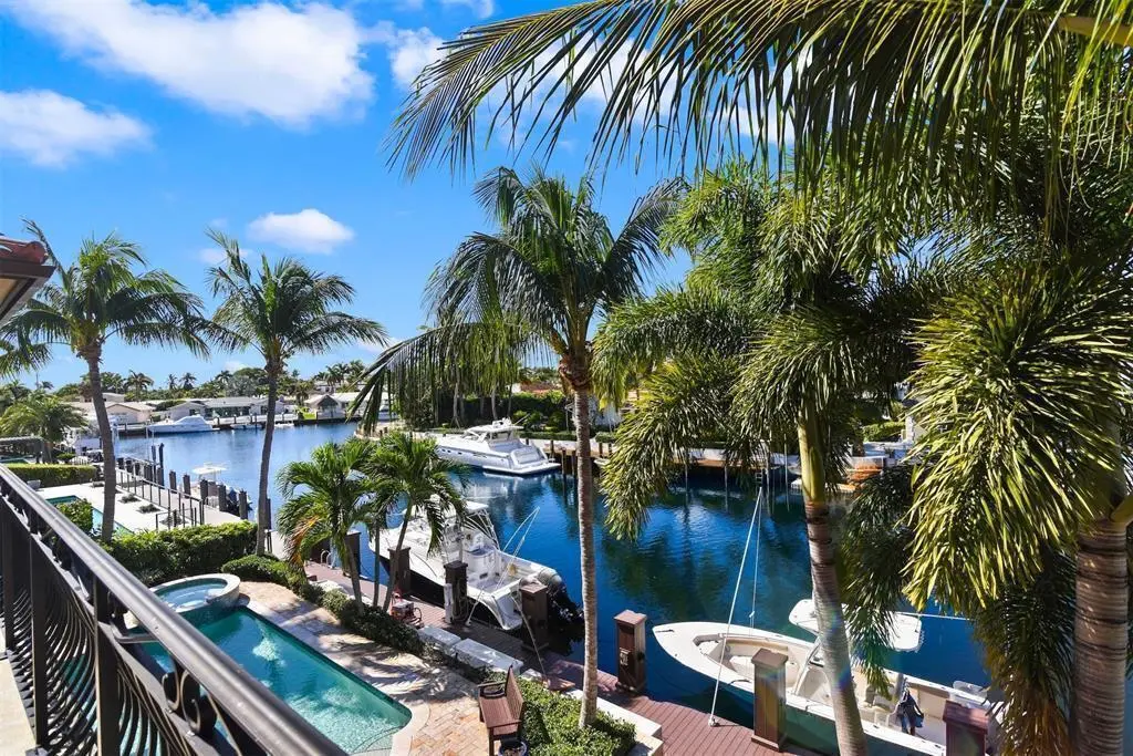 Backyard plus canal at 4431 NE 24th Avenue, Lighthouse Point
