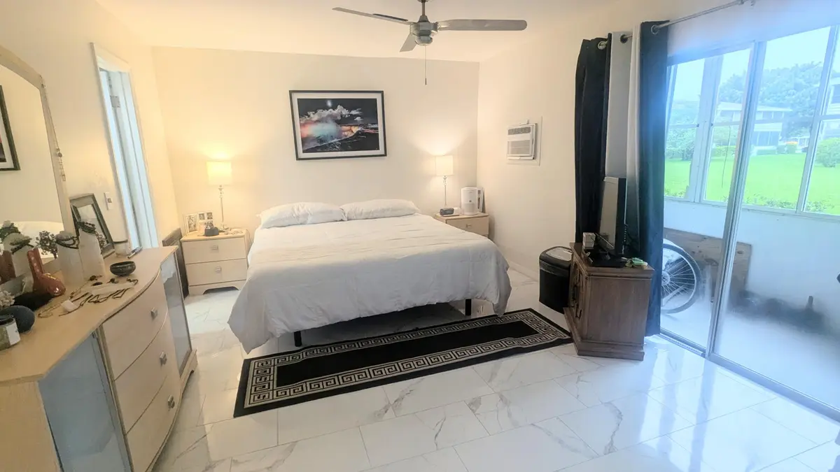 Large Bedroom w King Bed at 360 Windsor P, West Palm Beach
