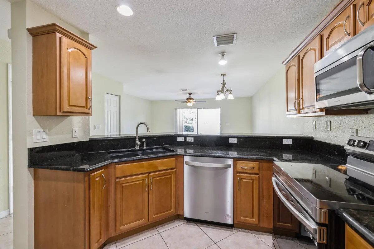 Kitchen Into Dining Living Area at 22131 Majestic Woods Way, Boca Raton