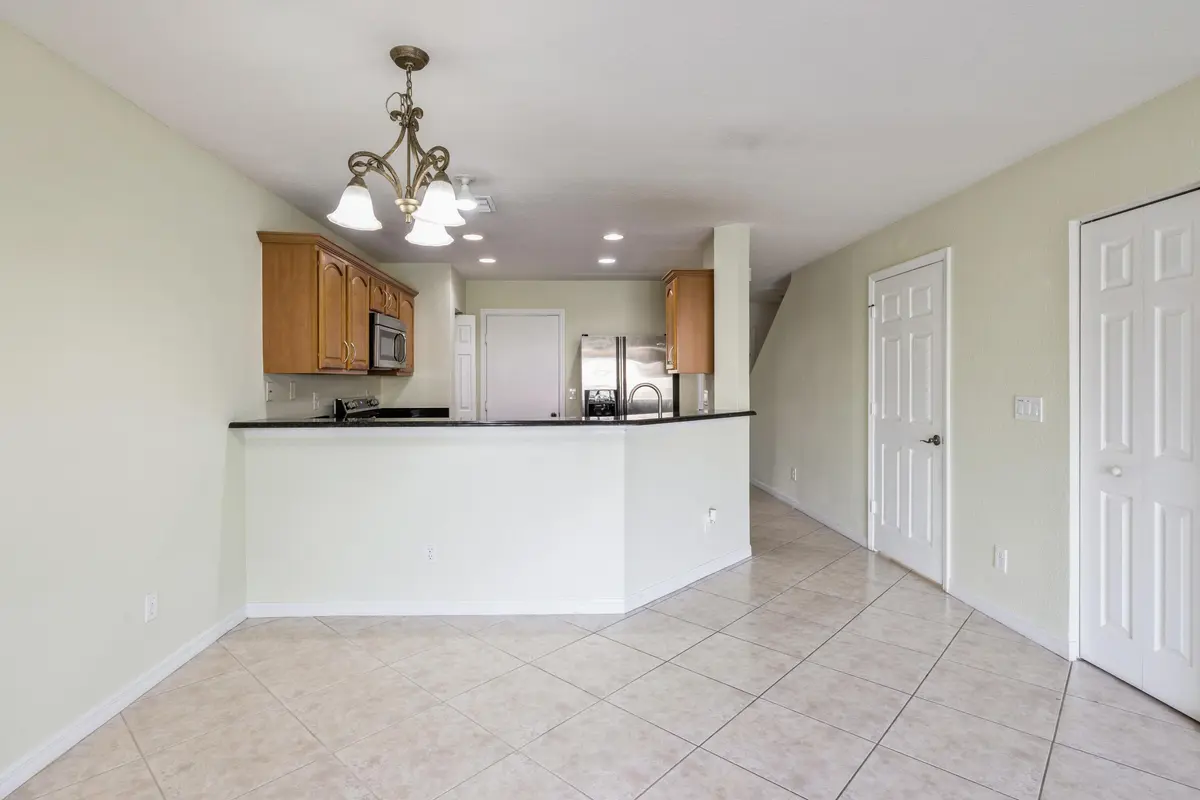 Dining Area Into Kitchen at 22131 Majestic Woods Way, Boca Raton