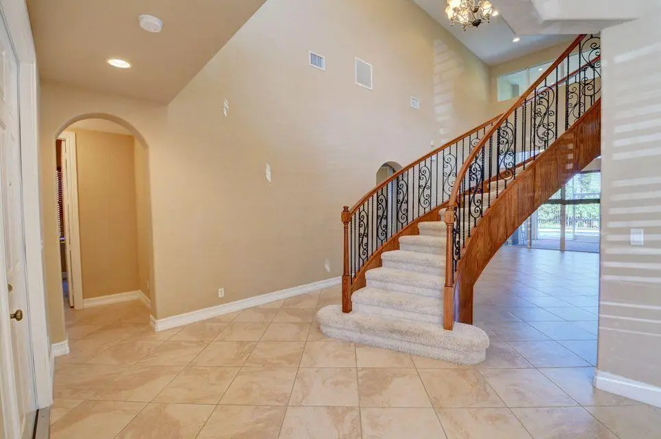 Grand Circular Staircase at 8800 COBBLESTONE POINT Circle, Boynton Beach